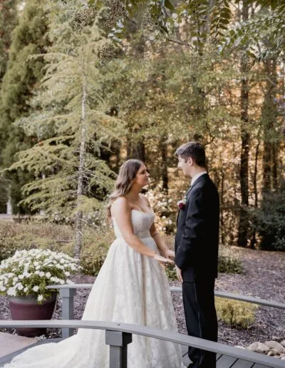 Bride and groom sharing a first look outdoors at Venue 92