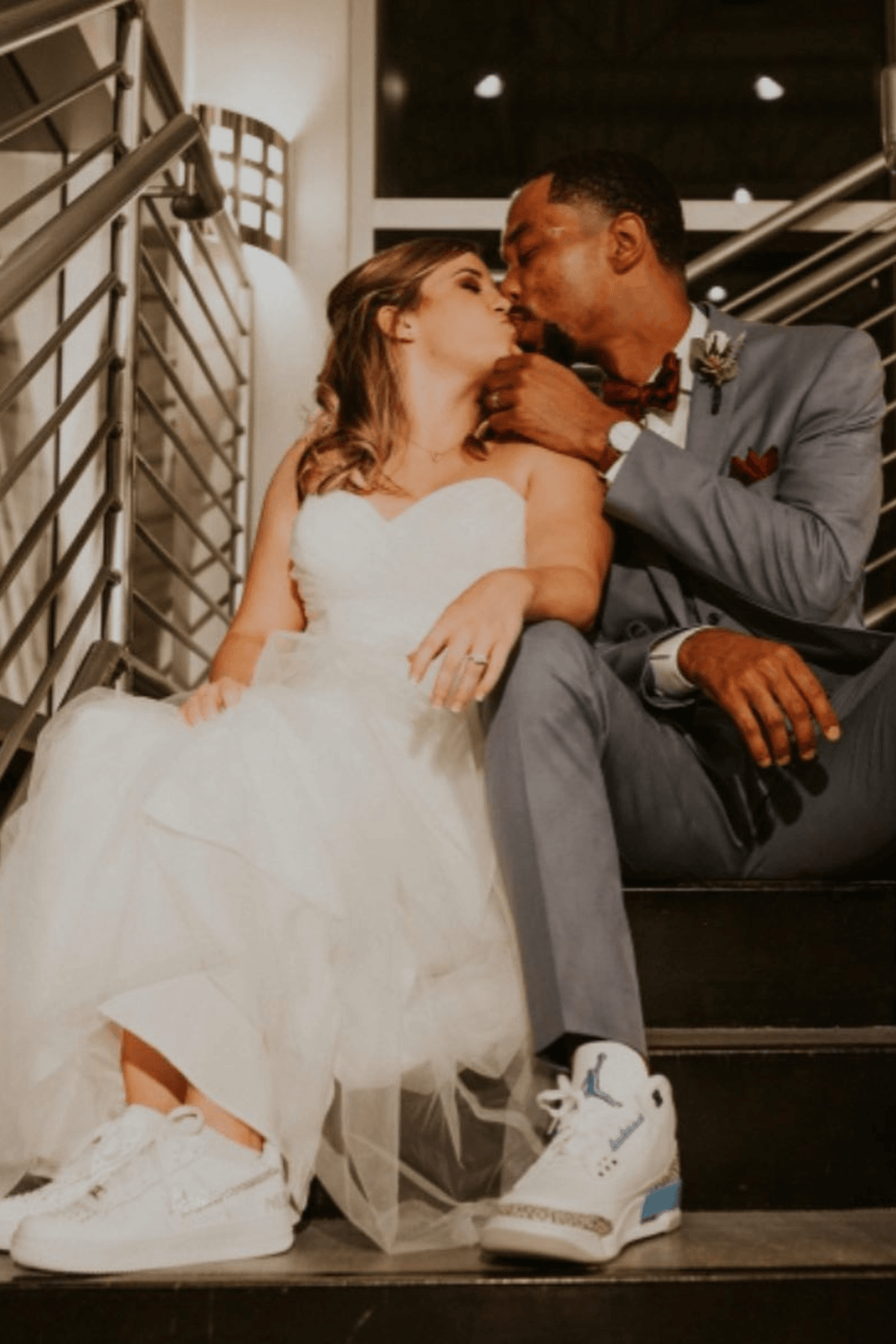 bride and groom at grand staircase at venue 92 in woodstock ga