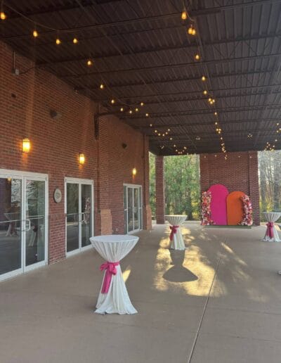 Outdoor high top tables with decor and lights