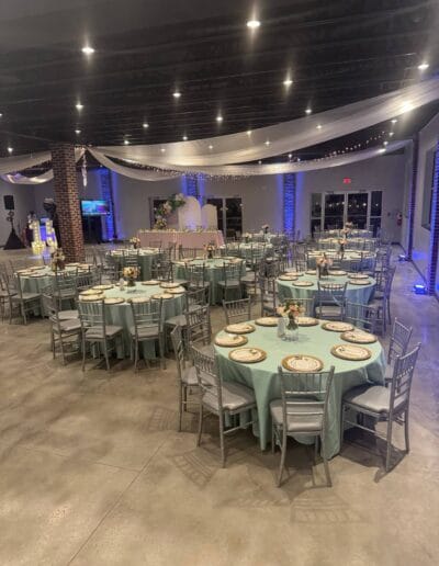 Decorated reception tables with decor and lighting
